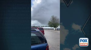 Watch: Tornado looms over fairgrounds in central Illinois
