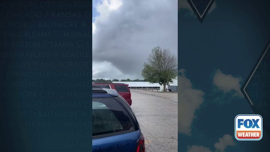 Watch: Tornado looms over fairgrounds in central Illinois