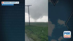 Watch: Funnel cloud forms over field in Illinois