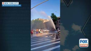 Watch: Water from fire hydrants help New Yorkers beat the heat