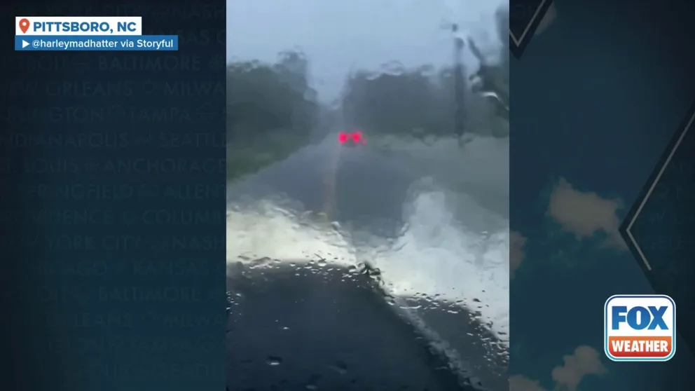 Heavy rain from the remnants of Tropical Depression Chantal flood road in central North Carolina.