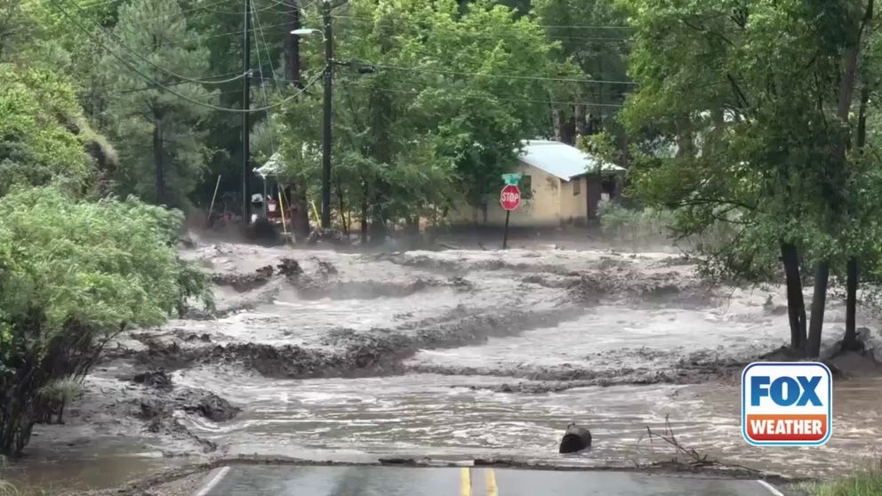 A video recorded in Ruidoso, New Mexico, shows fast-moving floodwaters rushing across a a road on Tuesday, July 8.