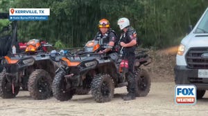 Texas search teams wait for rain to stop