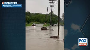 Watch: Camper sucked under bridge during Indiana flooding