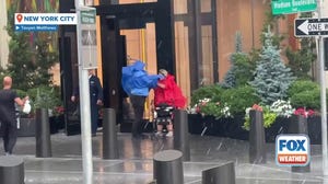 New Yorkers hit by downpours during storms 