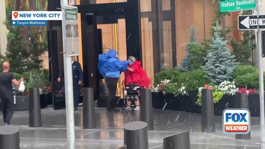 New Yorkers hit by downpours during storms 
