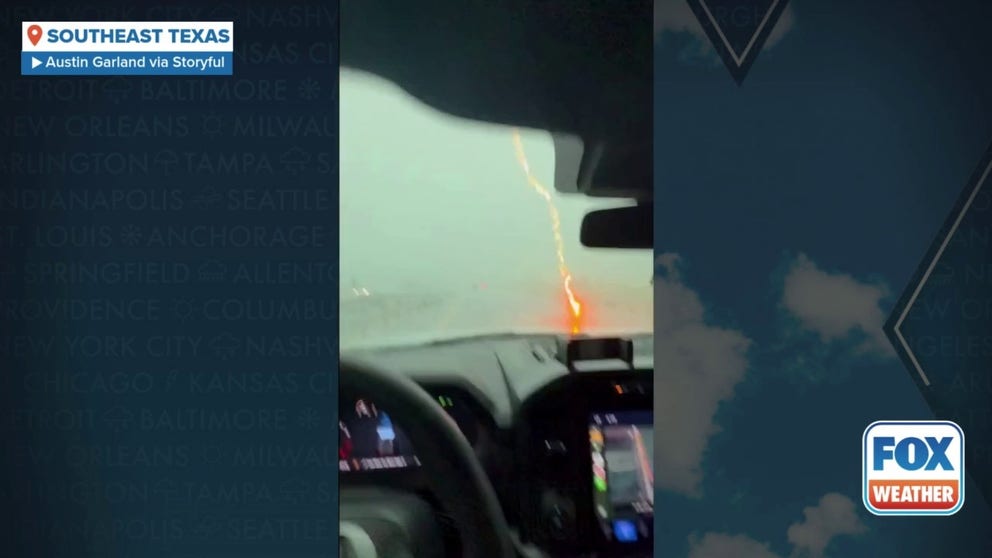 A video recorded in southeastern Texas shows the moment a bolt of lightning struck a truck as it traveled on Highway 59 between Wharton and El Campo on Friday, July 25.