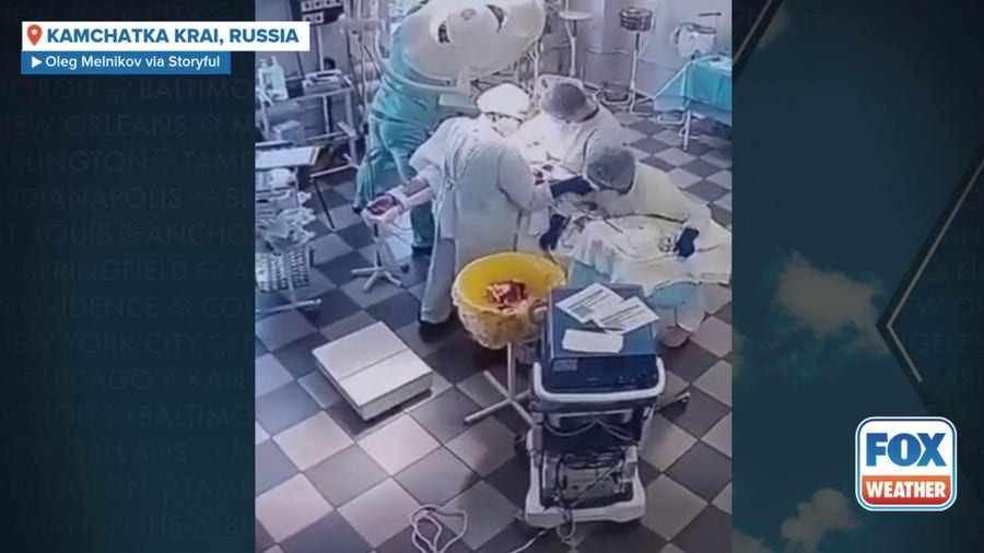 Surgeons brace patient during massive earthquake in Russia 