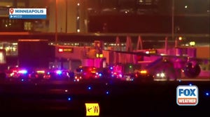 Watch: First responders surround Delta flight in Minneapolis