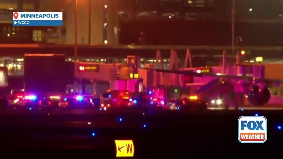 Watch: First responders surround Delta flight in Minneapolis
