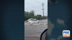 Watch: Cars drive through several inches of floodwaters in New Jersey