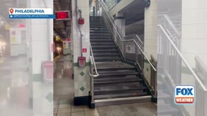 Rain pours down on Philadelphia Subway station