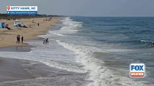 Watch: Beachgoers in North Carolina enjoy sun, sand ahead of Hurricane Erin’s impacts