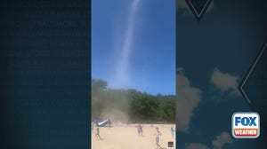 Watch: Dust devil at New York lake sends kids screaming