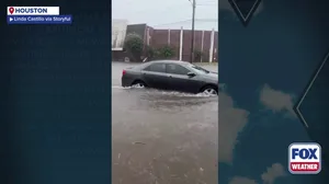 Watch: Houston flooding turns roads to rivers