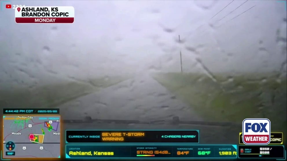 Watch: Large hail pounds on car windshield during severe weather