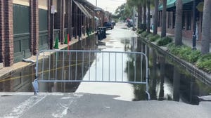 Flooding creeps into Charleston, South Carolina after high tide