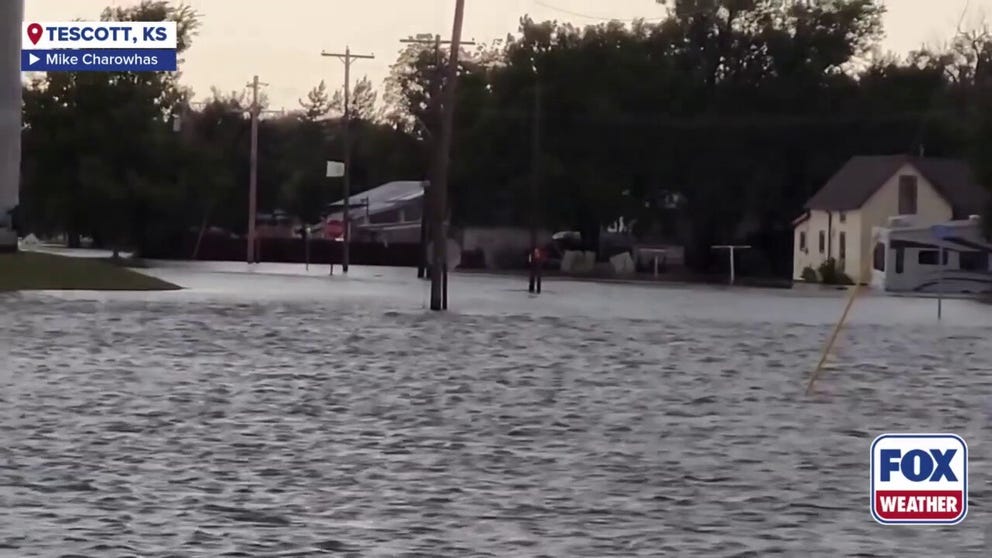 Roads in Tescott, Kansas, were turned into rivers after storms drenched the area.