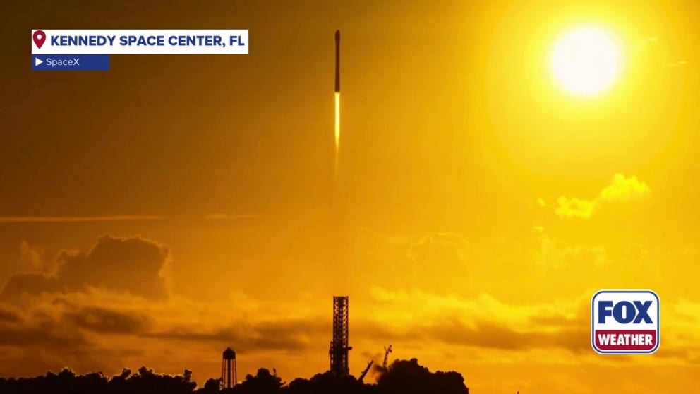 A SpaceX Falcon 9 rocket is seen blasting off from Kennedy Space Center, Florida on Wednesday, Sept. 24, 2025 as the sun rises above the Atlantic Ocean. The mission launches three satellites designed to improve space weather forecasting.