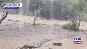 Arizona floods shut down roads