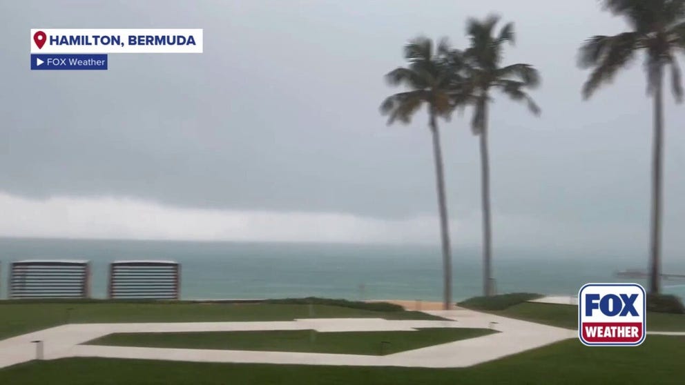 Rain from outer bands of Hurricane Humberto drenched Bermuda's capital of Hamilton Tuesday morning.