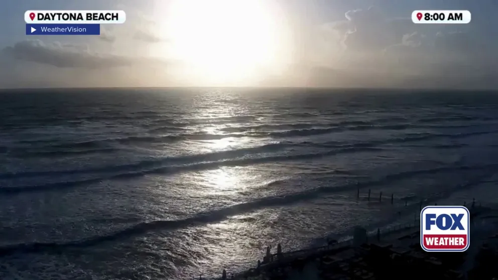 A time lapse video recorded in Daytona Beach shows the tide getting higher and higher on Tuesday morning, with waves reaching the seawall and sand dunes.