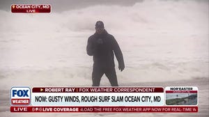 Gusty winds and rough surf slam Ocean City, Maryland