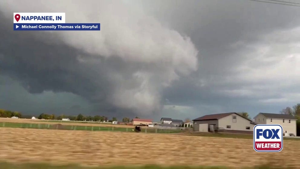 A video recorded in Nappanee, Indiana, shows a massive wall cloud swirling over a field as powerful thunderstorms moved over the area on Oct. 18, 2025.