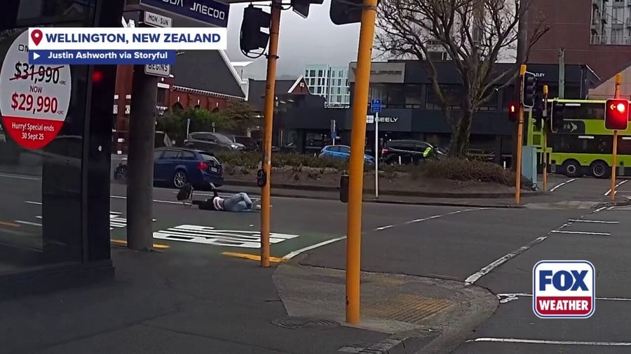 Woman shoved into oncoming traffic by powerful wind in New Zealand