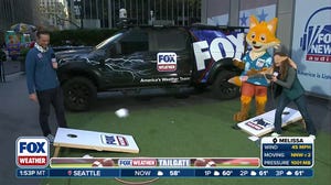 Watch: Nick Kosir and Bayne Froney play cornhole blindfolded at FOX Weather Tailgate