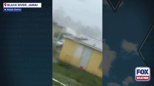 Hurricane Melissa peels back roofs from homes in Black River, Jamaica