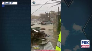 Watch: Jamaican residents take refuge at police station as Hurricane Melissa lashes region