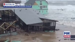 Intense footage in North Carolina shows violent waves crashing into homes and knocking them over