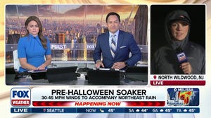 Rain and powerful winds gusts batter Northeast ahead of Halloween