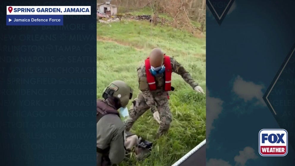 The Jamaican Defence Force said an elderly woman was evacuated during a food drop mission to areas devastated by Hurricane Melissa on Sunday.