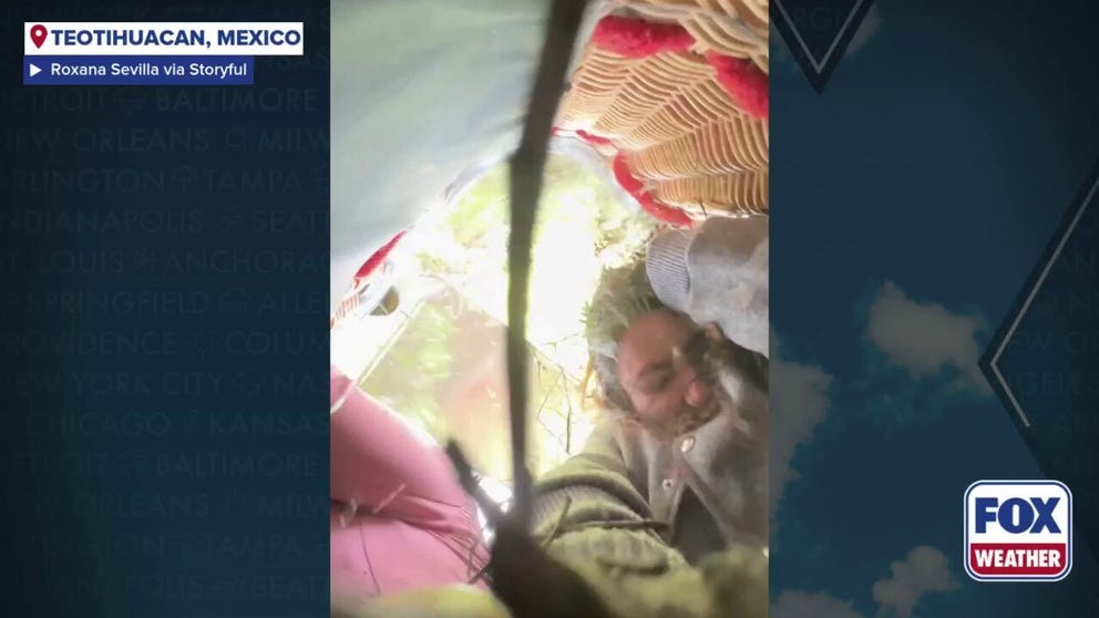 Some hot air balloon riders got a surprise when their balloon drifted into a tree in Mexico. Branches and leaves hit the riders as they settled into the tree. 
