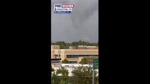 Watch: Funnel cloud looms over Houston skyline, as radar-confirmed tornado damages homes