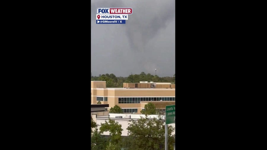 Watch: Funnel cloud looms over Houston skyline, as radar-confirmed tornado damages homes