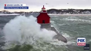 Watch: Massive waves crash against Lake Michigan lighthouse amid cold front