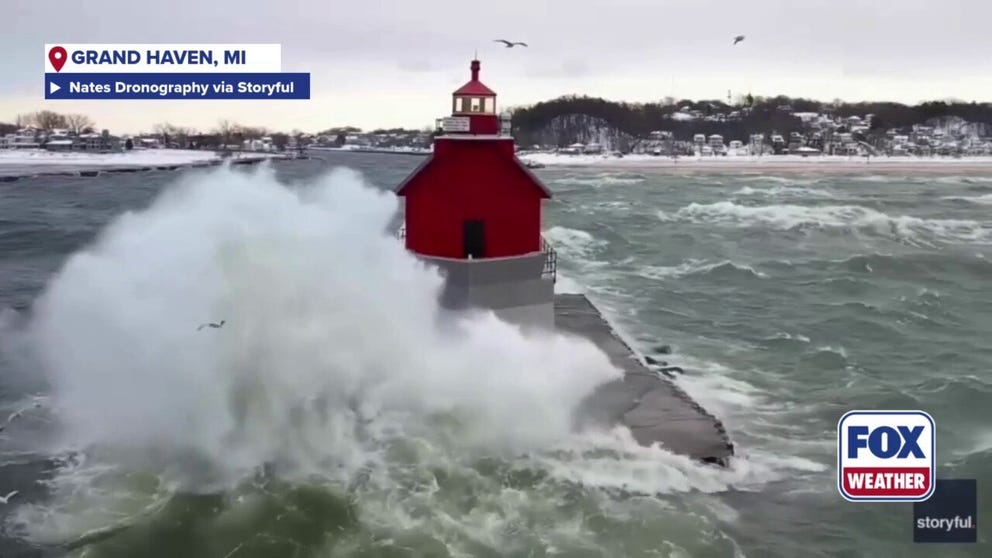 Drone footage captures powerful waves continuously striking against a lighthouse on the eastern shore of Lake Michigan Dec. 5. Frigid temperatures followed as more than half the country fell below average as the cold front pushed through.