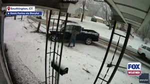 Driver crashes into pole after losing control on icy Connecticut road