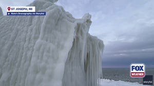 Eerie sight: Bitter cold transforms Michigan lighthouse into 'ice monster'