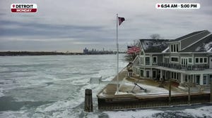 Watch: Ice clogs surface of Detroit River