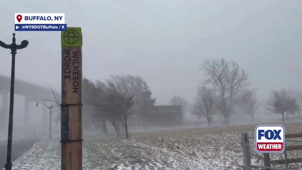 Intense snow and winds lash at travelers in Buffalo, New York, on Monday.
