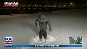 Lake-effect snow blankets Oswego, central New York