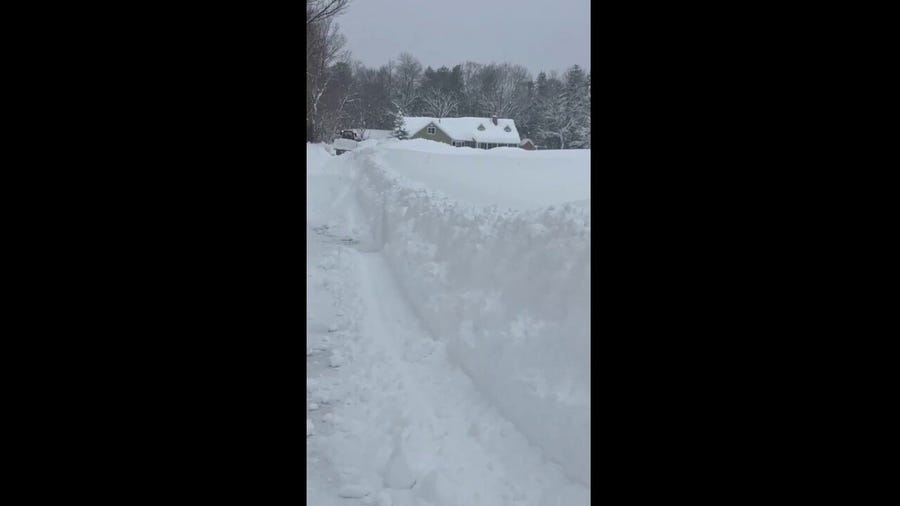 Residents in upstate New York dig themselves out of heavy snow