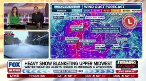 Heavy snow moving east toward the Midwest