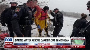 Heroic water rescue carried out in Michigan after fisherman falls through the ice