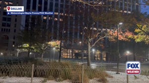 Snow falls across Dallas early Saturday morning
