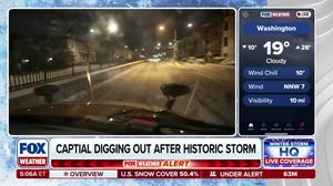 Crews dig out Washington, D.C. after powerful winter storm